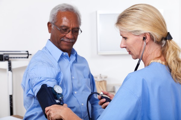 image depicting blood pressure being taken