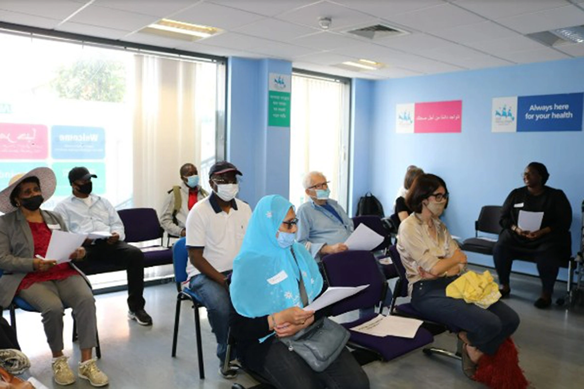 Image shows a meeting held at the practice